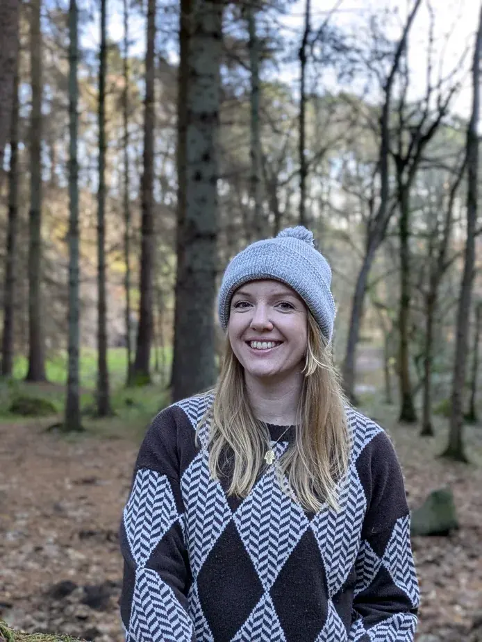 Portrait of a smiling yoga instructor.
